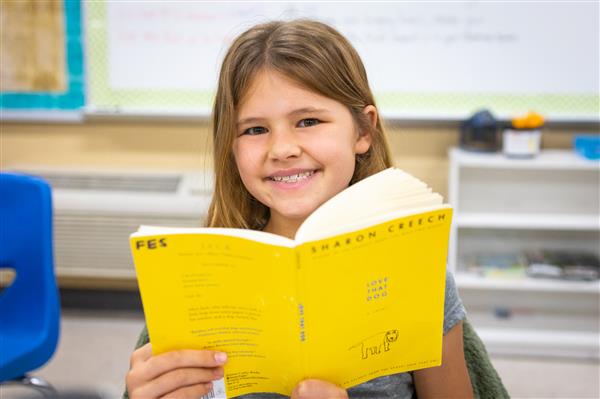 Students inside their classrooms learning. 
